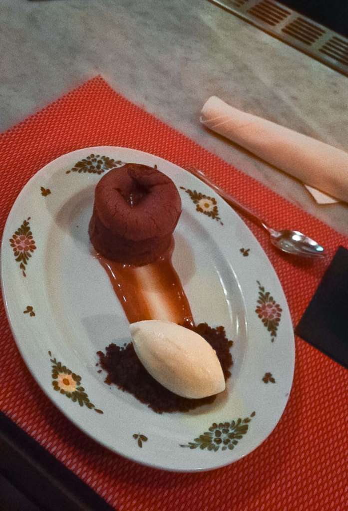 plate of dessert on a red placemat at Osteria Morini in Washington DC