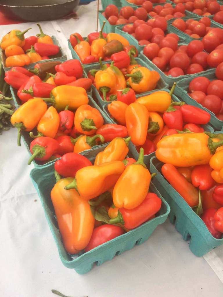 orange peppers and cherry tomatoes at Union Square Greenmarket